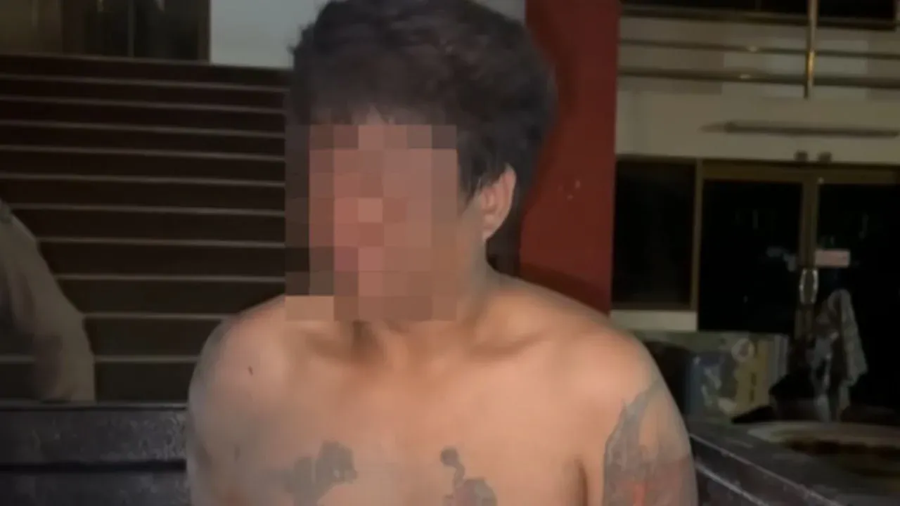 경찰 조사를 받는 용의자